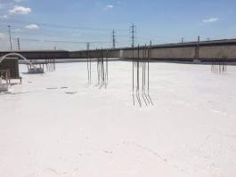 גג מפעל גדול לאחר איטום וסיוד שביצעה חברת האיטום "ירוק עד - איטום גגות ומרפסות)